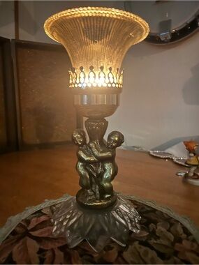 Hollywood regal brass and glass cherub lamp base / candlestick holder